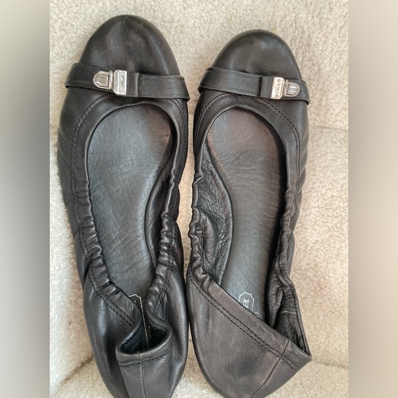 Coach Shoes - Coach black leather ballet flats NWOT no wear size 7 silver detailing